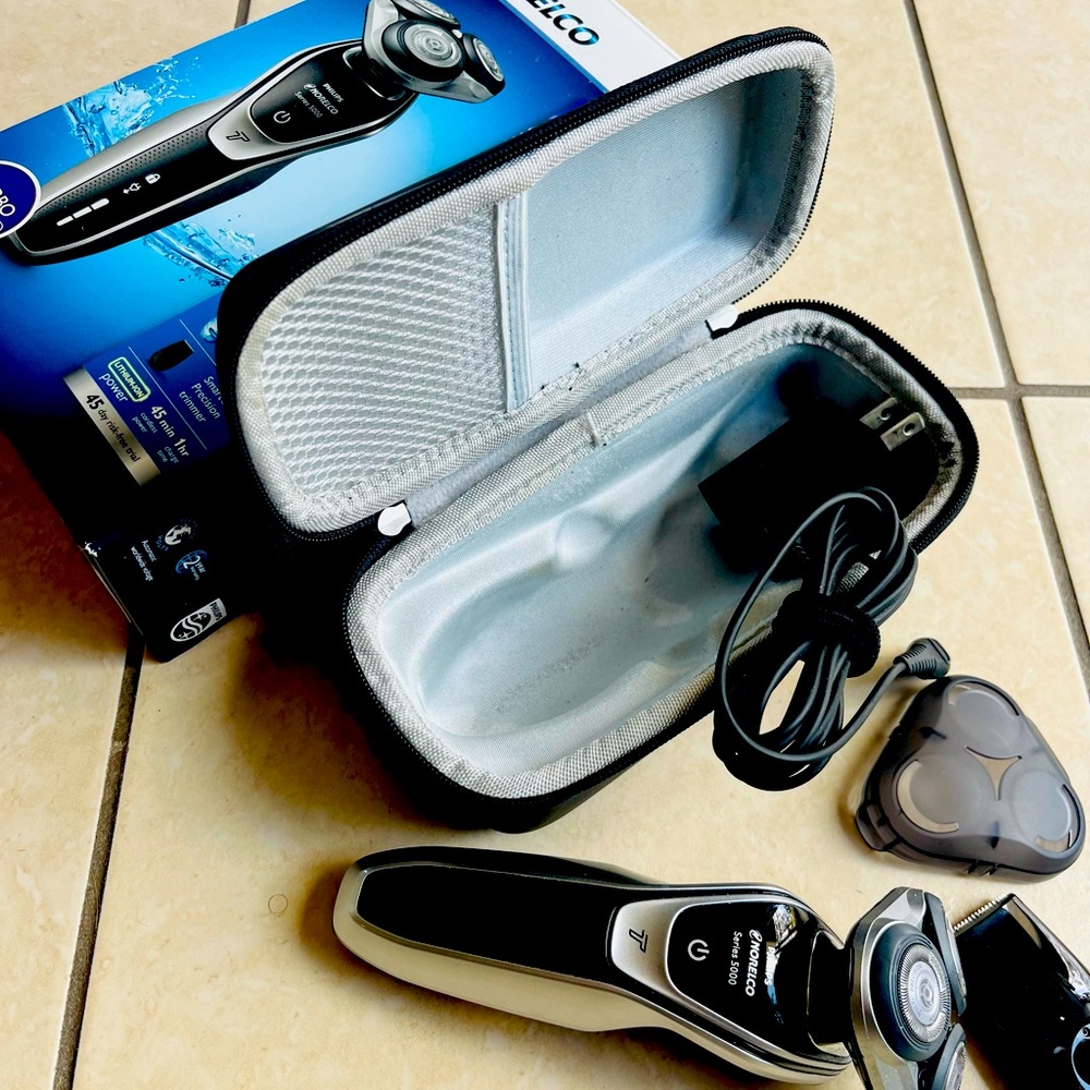Turbo powered Norelco, wet, dry, shaver, and precision trimmer, a case